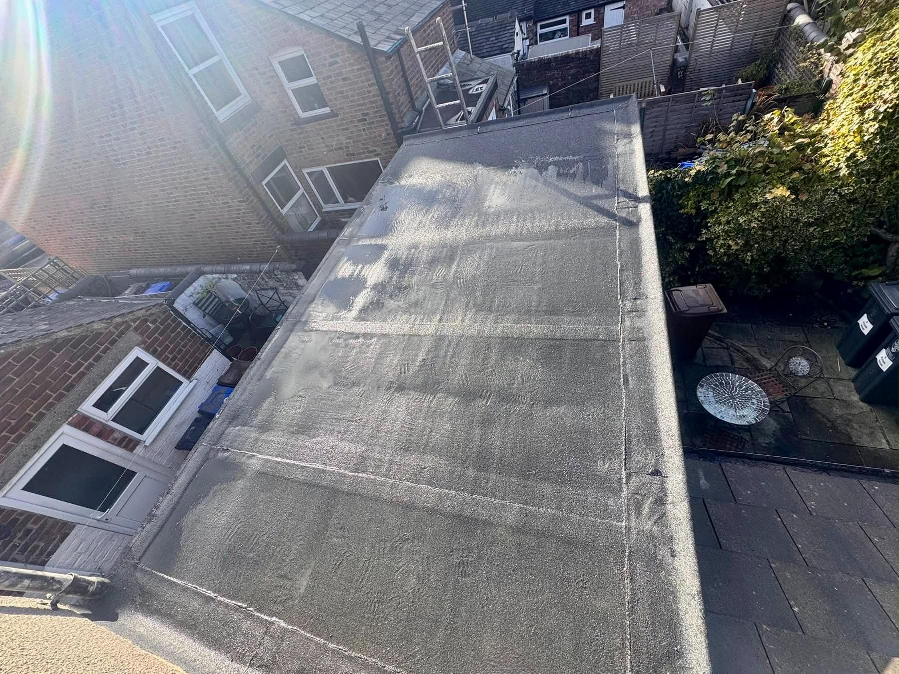 Completed felt flat roof on a terraced home extension